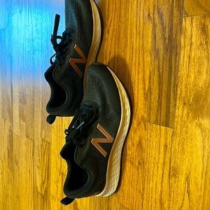 Woman’s black NewBalance fresh foam tennis shoes size 8